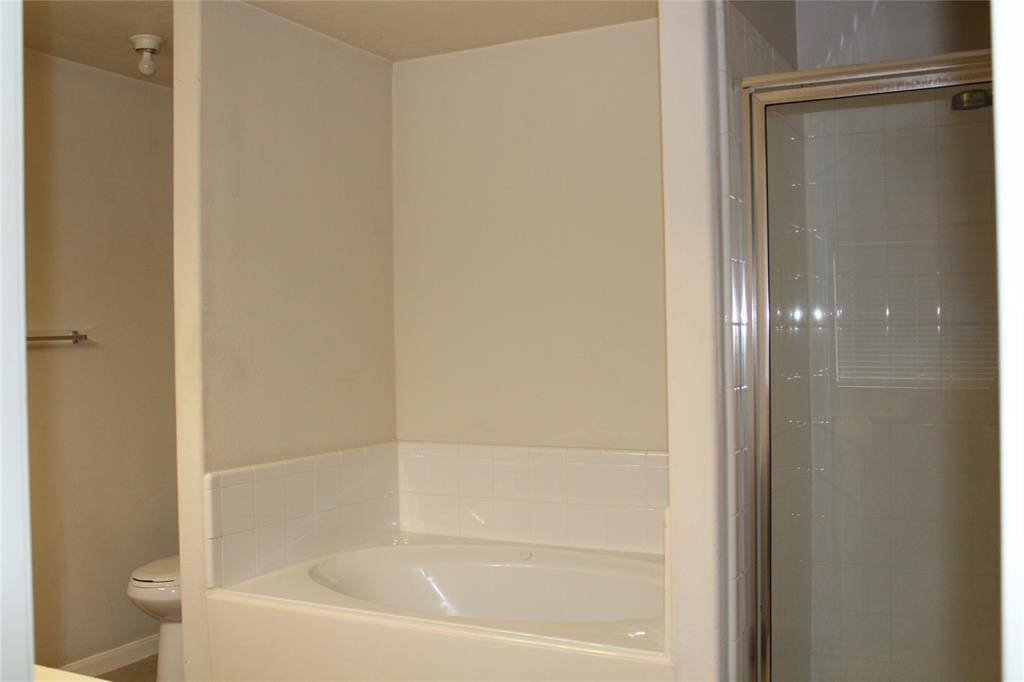 Separate tub/shower in primary bathroom.