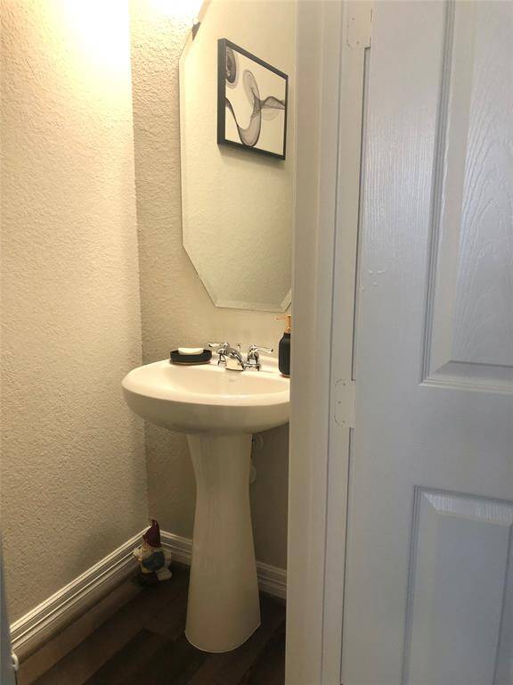 Extra large shower with glass enclosure  bench.