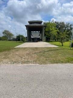 RV not included!! Bathhouse on Bottom with large covered deck