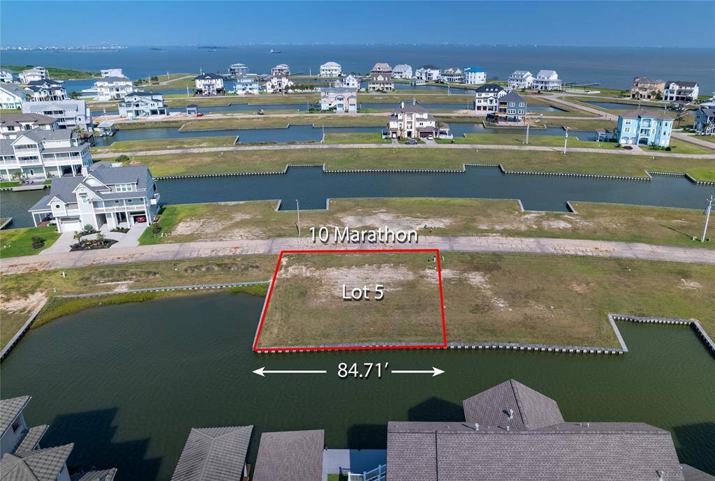 Boat-slip accommodations on this homesite will allow a 40' boathouse one of the few left at Harborwalk.