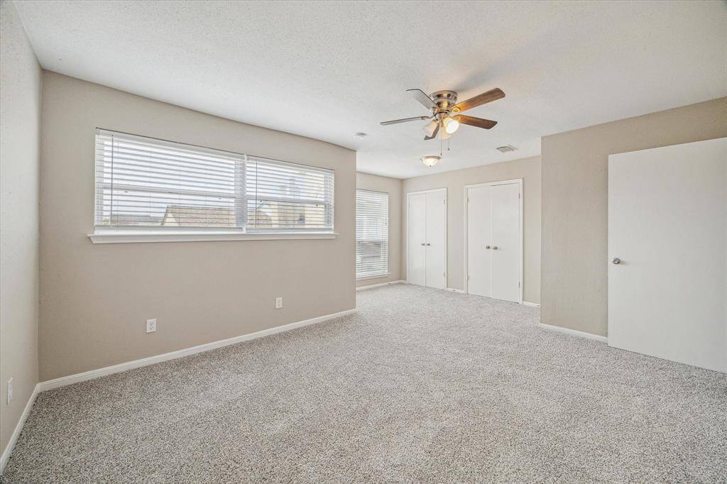 You'll enjoy the extra large primary bedroom. There's enough room for a desk or a comfy reading corner.