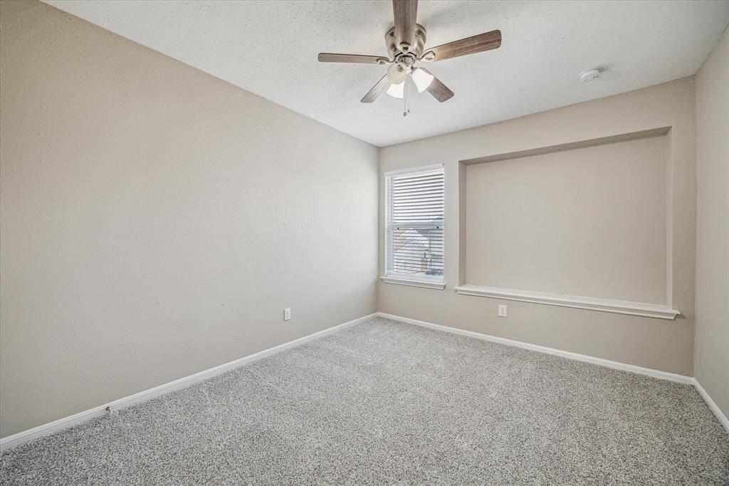 The secondary bedrooms face the front of the property.