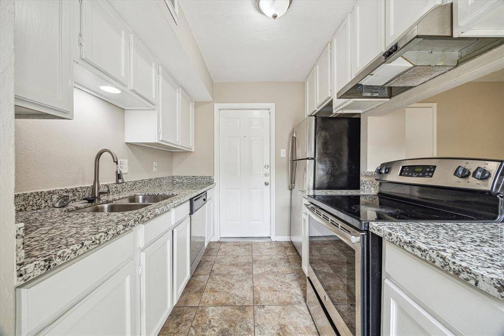 The kitchen was updated to feature granite countertops.