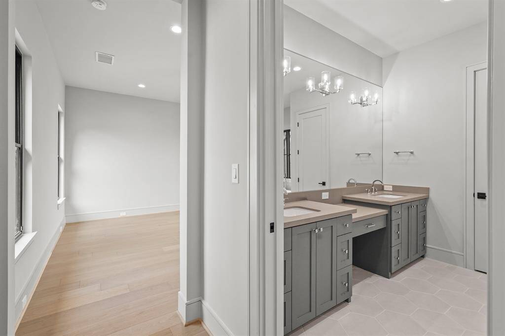 The master suite sits on the front of the home with views of both front and back yards!