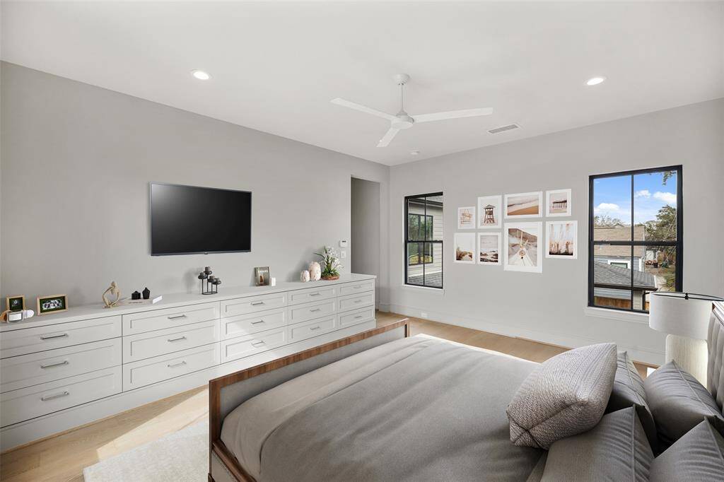 Virtually staged with a king sized bed and night stands!