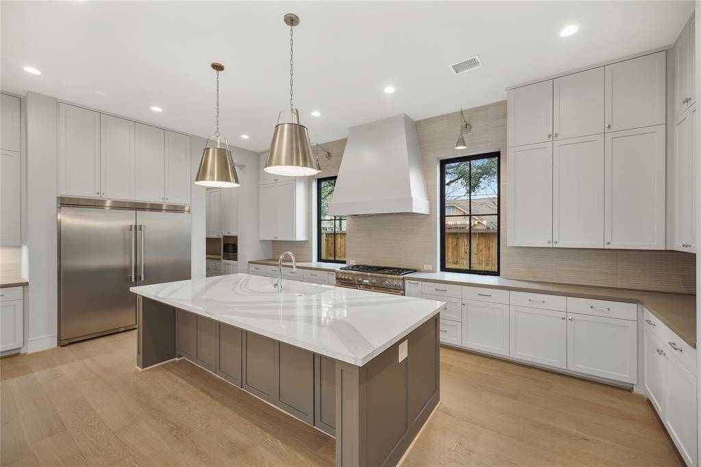 Open concept, contemporary design, and tons of storage!