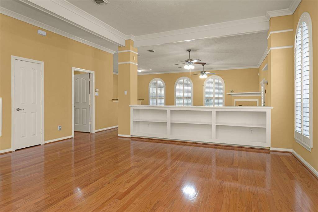 The open layout features a Formal Living or Dining Room separated from the Family Room. Featuring built-ins!