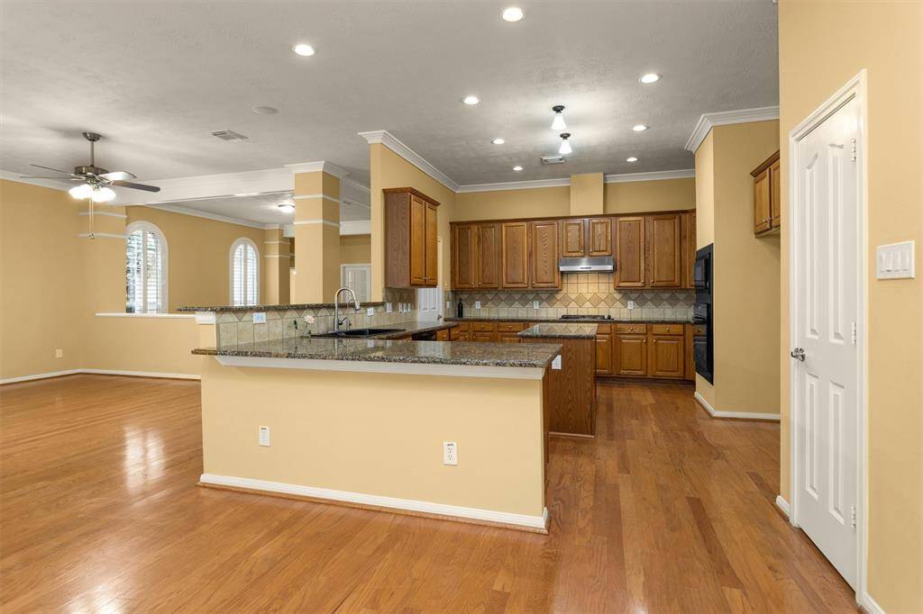 Open Layout is perfect for gatherings w/ a spacious Kitchen & Island.