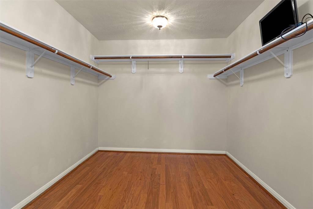 The Primary Suite also features a spacious Walk-In Closet.