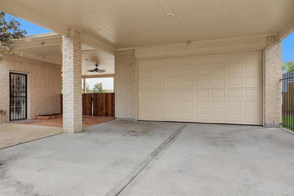 Spacious Storage Room over the Attached Garage, which also features a 3rd Garage Door opening to the Yard.