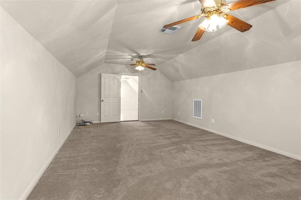 The Garage Apartment offers a Bedroom, Bathroom, & spacious Storage Room.