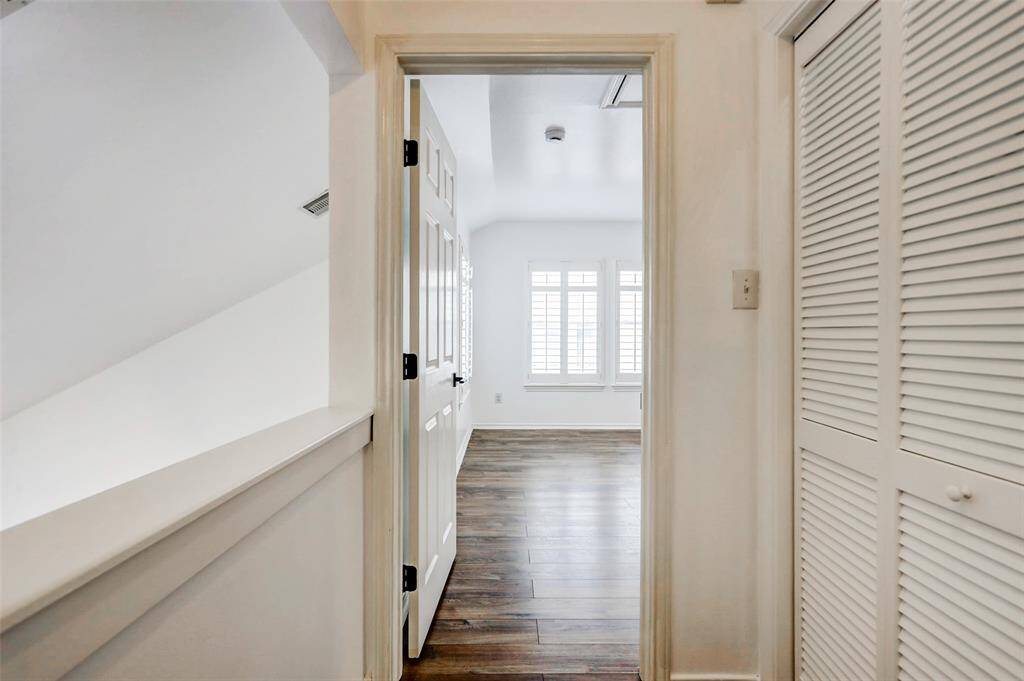 Hallway to primary bedroom