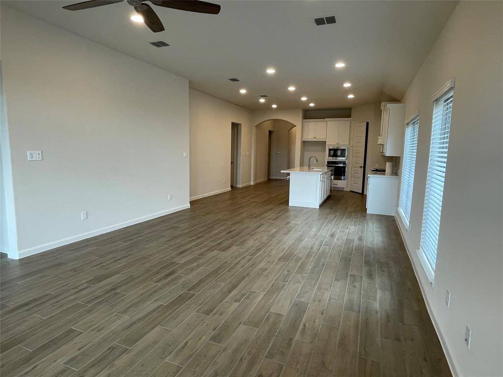 Open Concept for Family gathering, Dining and Kitchen says it all.