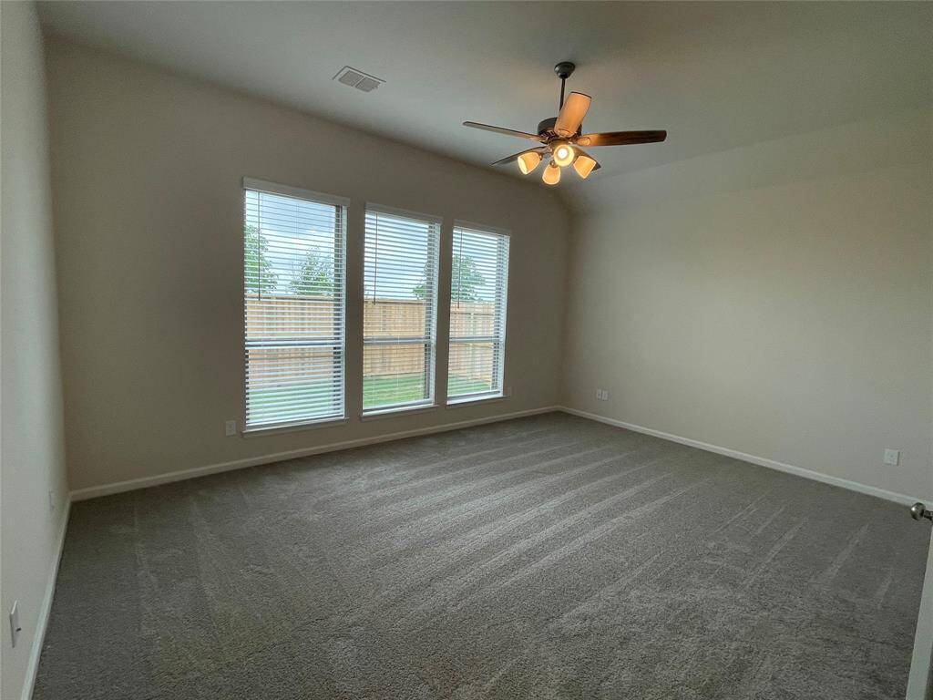 Huge Primary suite offers enough room for any size bedroom furniture set.