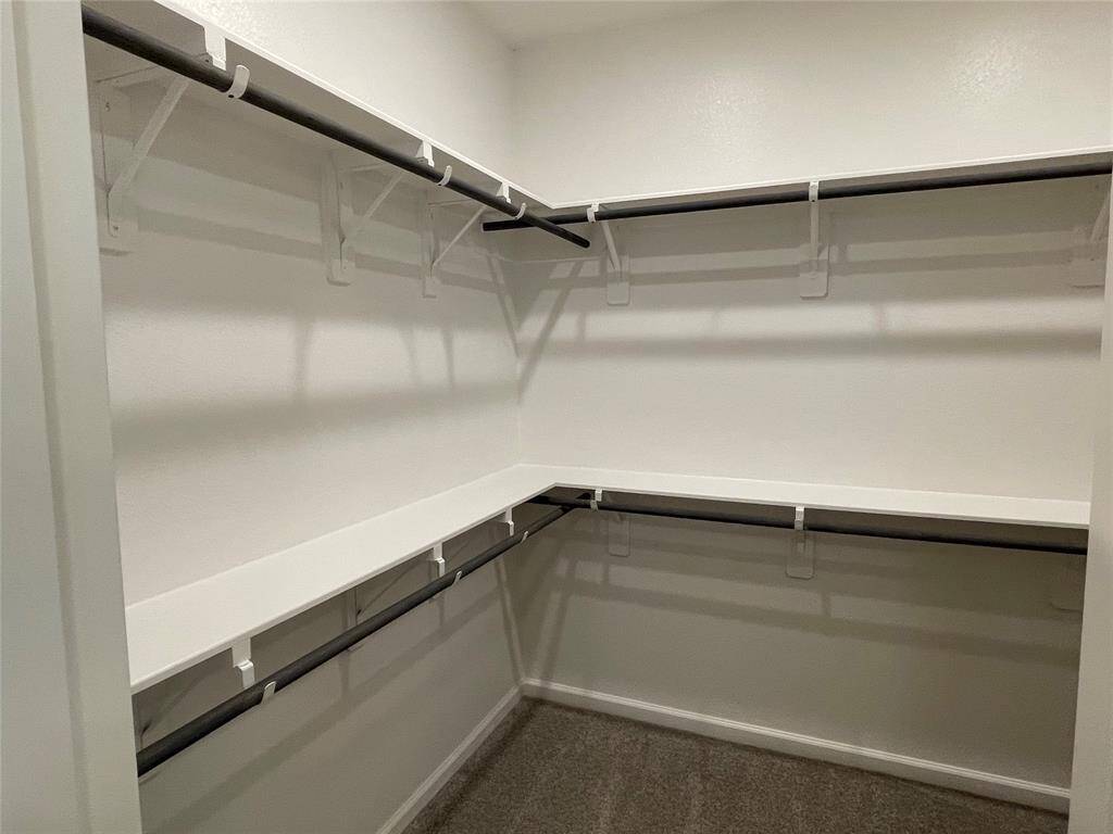 Spacious Primary Walk-in Closet.