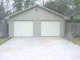 These are insulated doors. Space for parking car on one side, storage and office on other side with window, heat, air and half bath. Do you need to work from home???