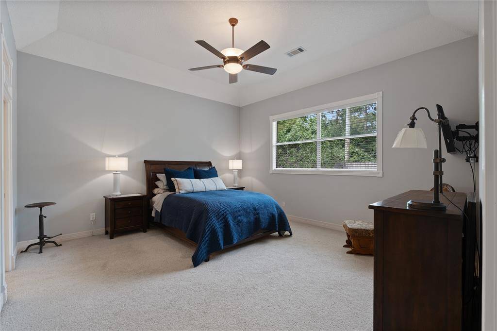 Primary Suite, High Ceilings, Large Window with a View of the Back Yard