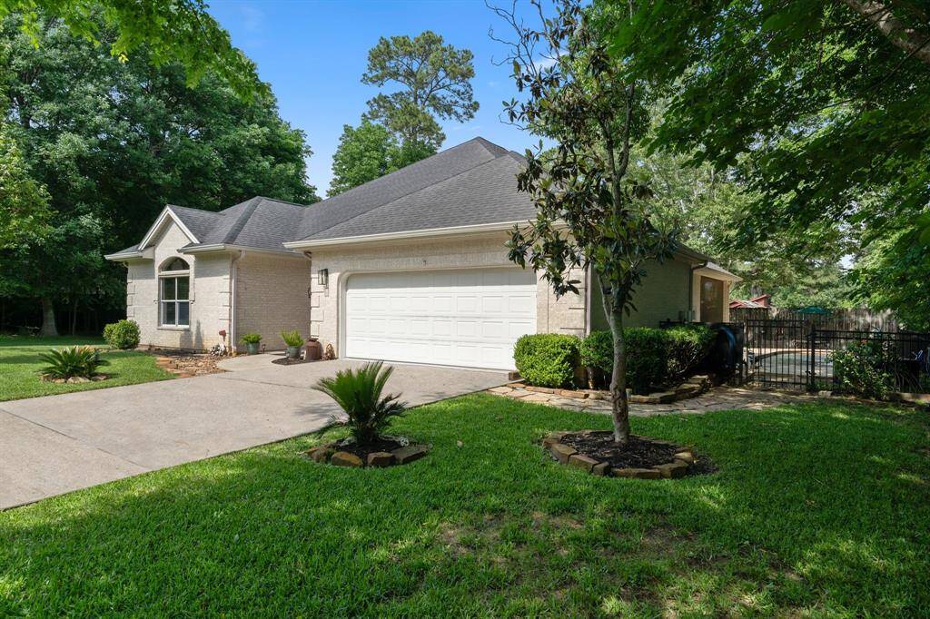 This home is surrounded by lush, mature landscaping!