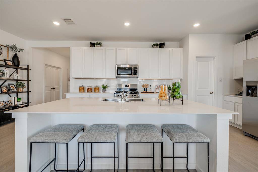 Pics are not of actual home.  They are a representative of a home of the same floor plan