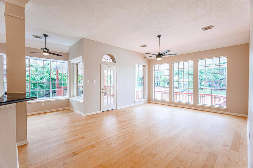 Easy-clean bamboo flooring in family room overlooking the lake.