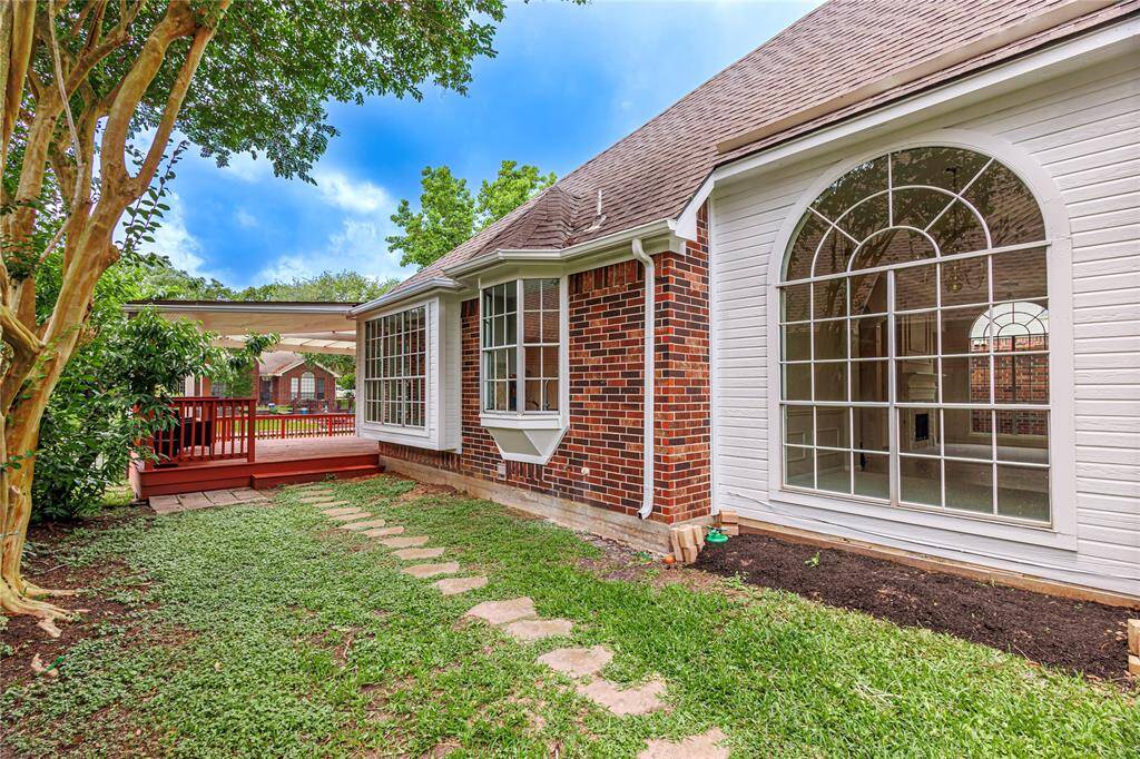 Mowing will not be a big chore here with convenient patio lot.
