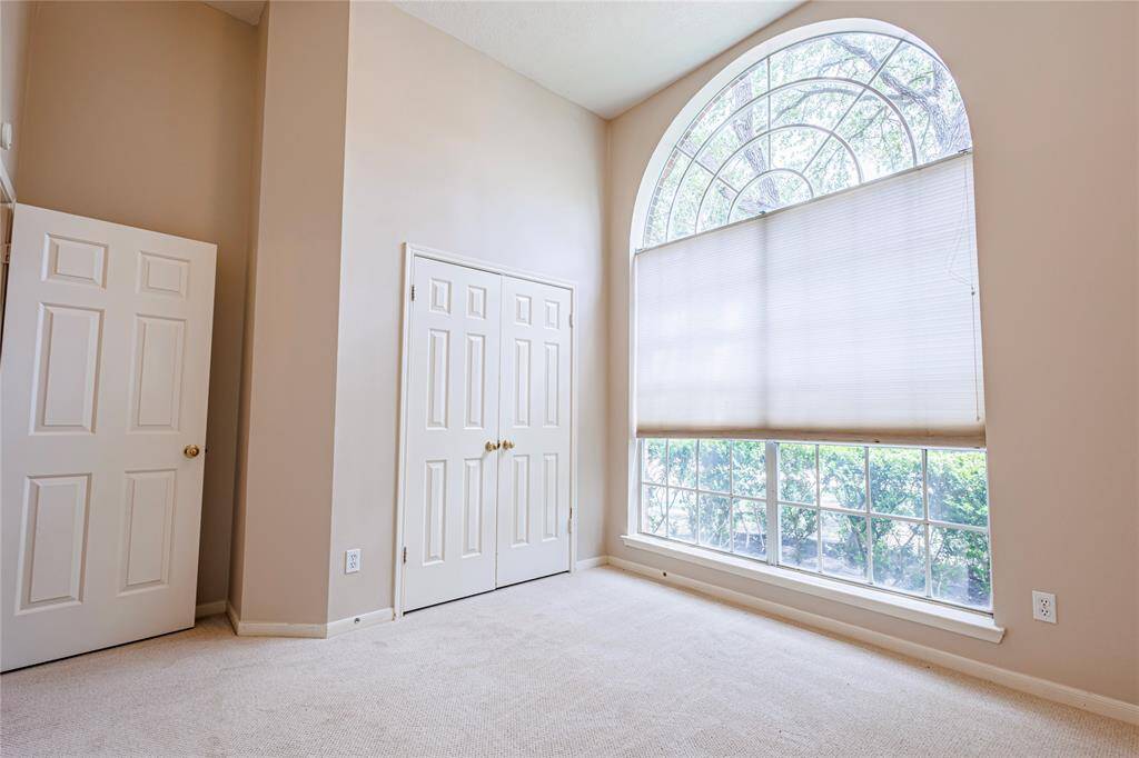 Front bedroom with new designer carpets.