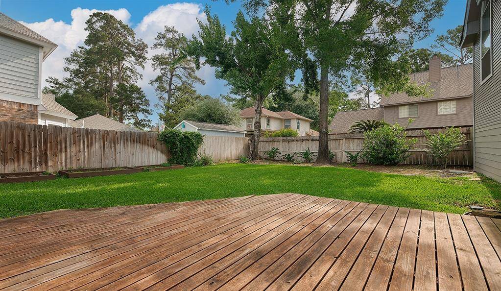 Large Wood Deck & plenty of space for Gardening!