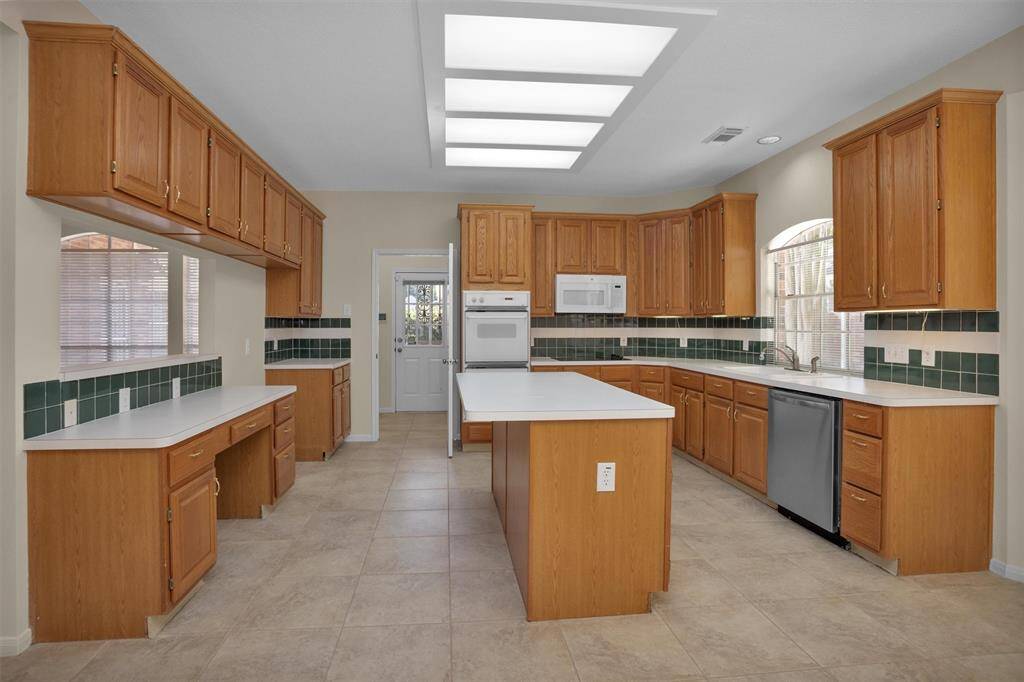 Large island kitchen with loads of cabinets
