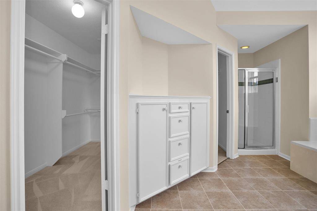 2 door entry to the primary closet off the primary bathroom