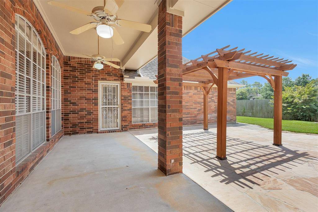 Door from primary bedroom opens to the back patio