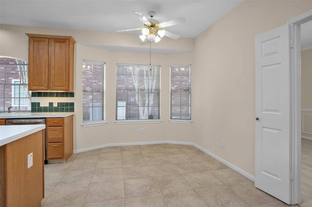 Breakfast area off the kitchen showing door to dining room