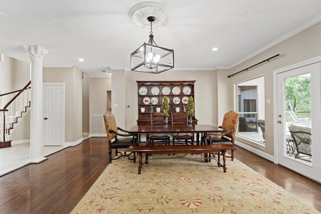 High ceilings and refined architectural details enhance the room’s airy, inviting ambiance.