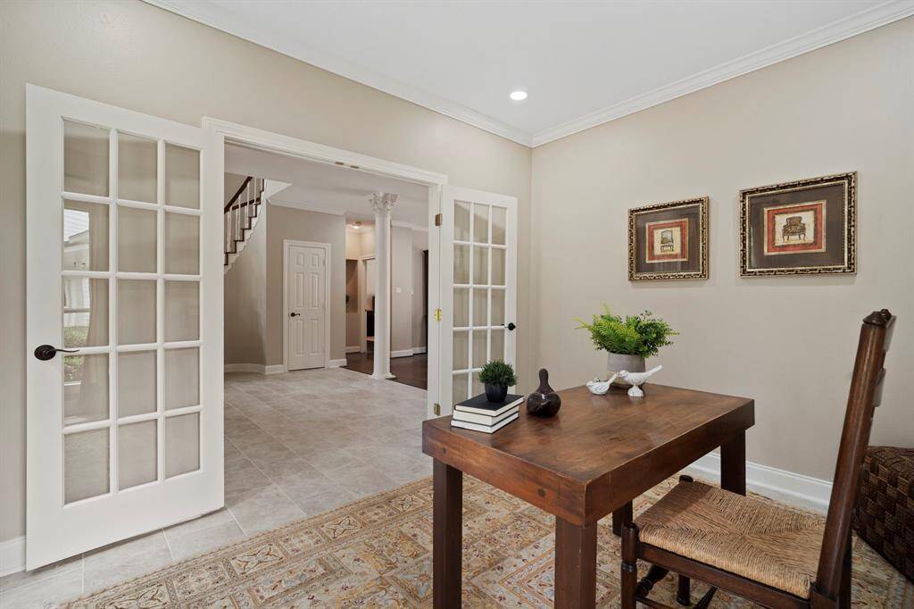 Just off the front entry, you'll find a stylish and functional home office, perfectly positioned for productivity and convenience.