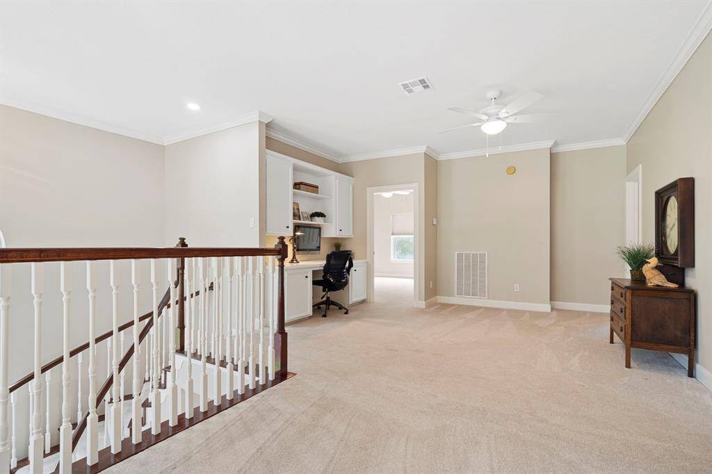 Bathed in natural light, this multi-functional area blends seamlessly with the home’s design while providing a practical and stylish use of space.