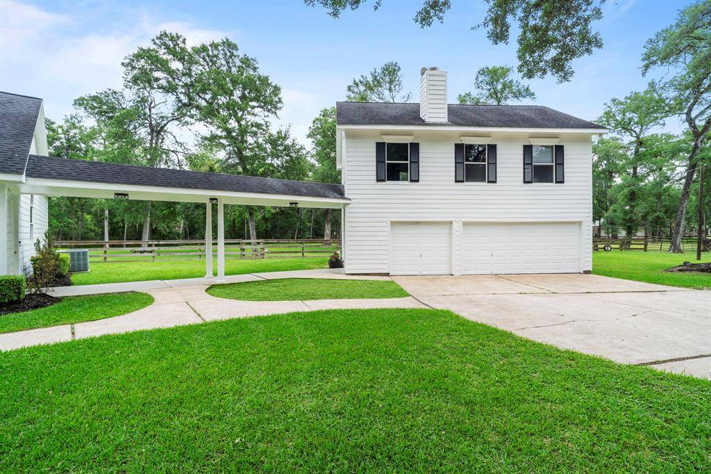 This home includes a separate garage with additional living space above.