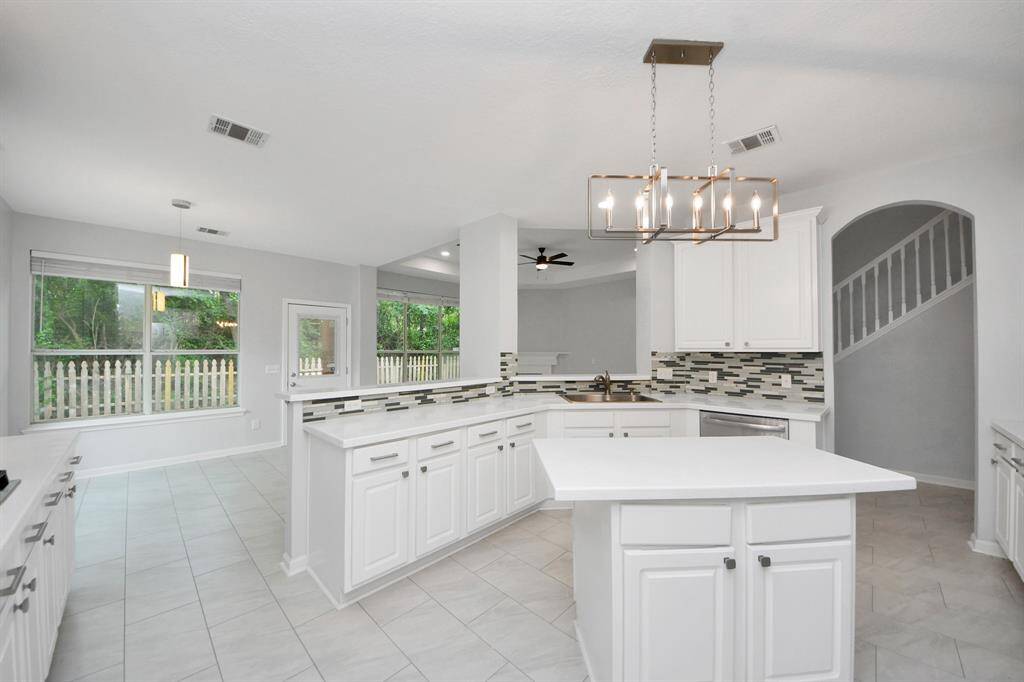 Kitchen overlooking the great room,  this is great for friends and family gatherings.