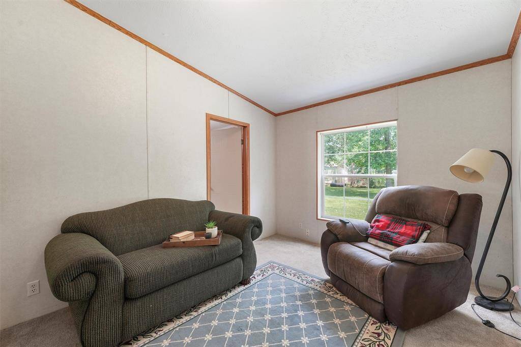 Bonus room is attached to the Primary Bedroom, with entrance to Primary Bath. Perfect for a home office, baby nursery, workout room, reading room, or extra TV/Gamer room.