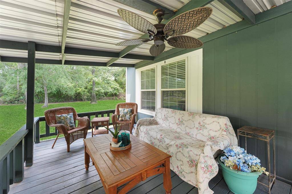 Wonderful, covered front porch to sit and watch the world go by, and enjoy on cool, raining summer days
