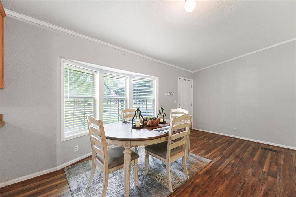 Dining room area or make it another sitting area to look out onto the front yard.