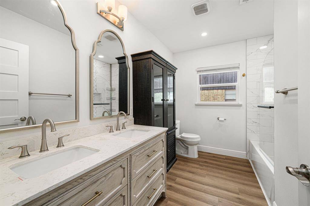 Front full bath shared with bedroom #3 & #4.