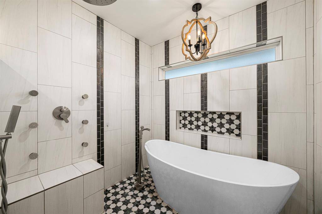 Soaking tub with walk-in shower.