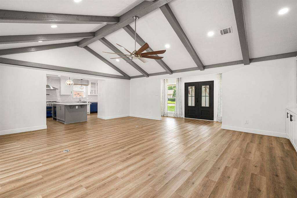 Vaulted ceilings in the living room.  Open to the kitchen.