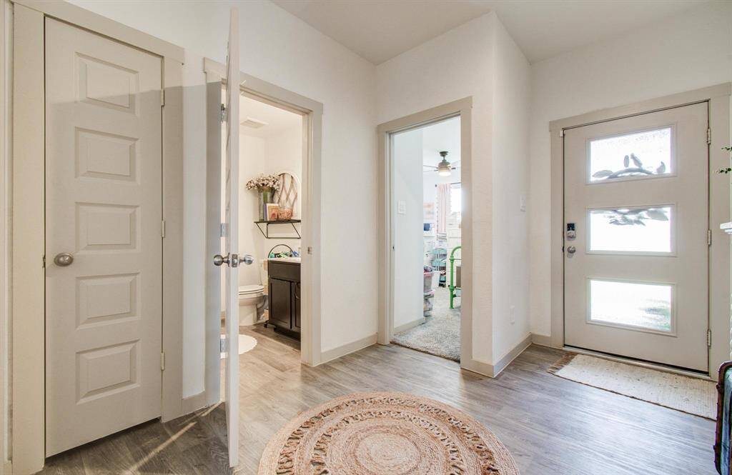 Entryway with 2 bedrooms and 1 full bathroom off of it!