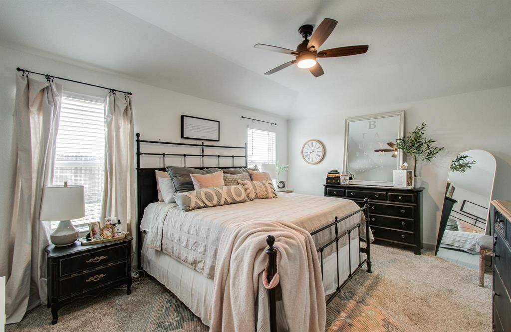 Primary suite with view of backyard!