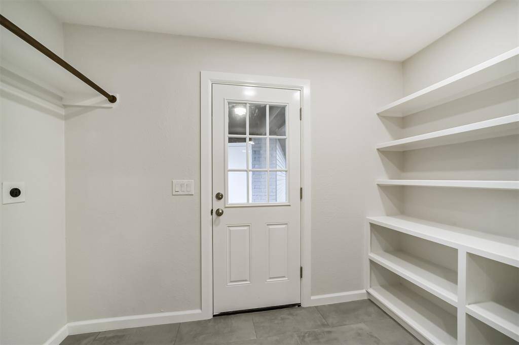 Laundry room/mudroom with plenty of extra storage