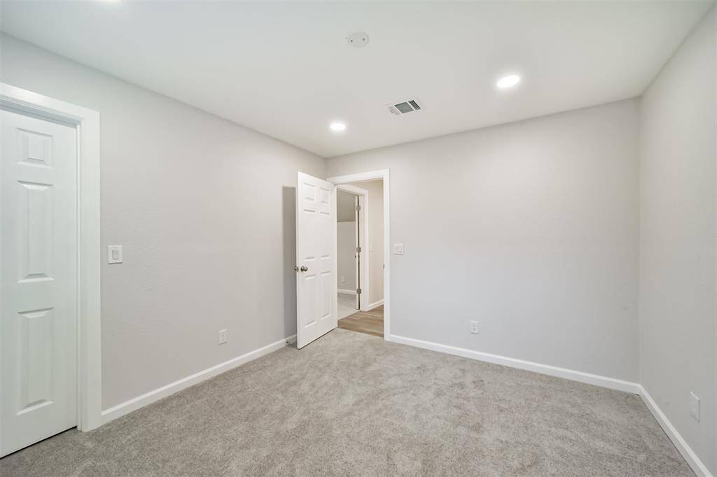 Bedroom with walk-in closet