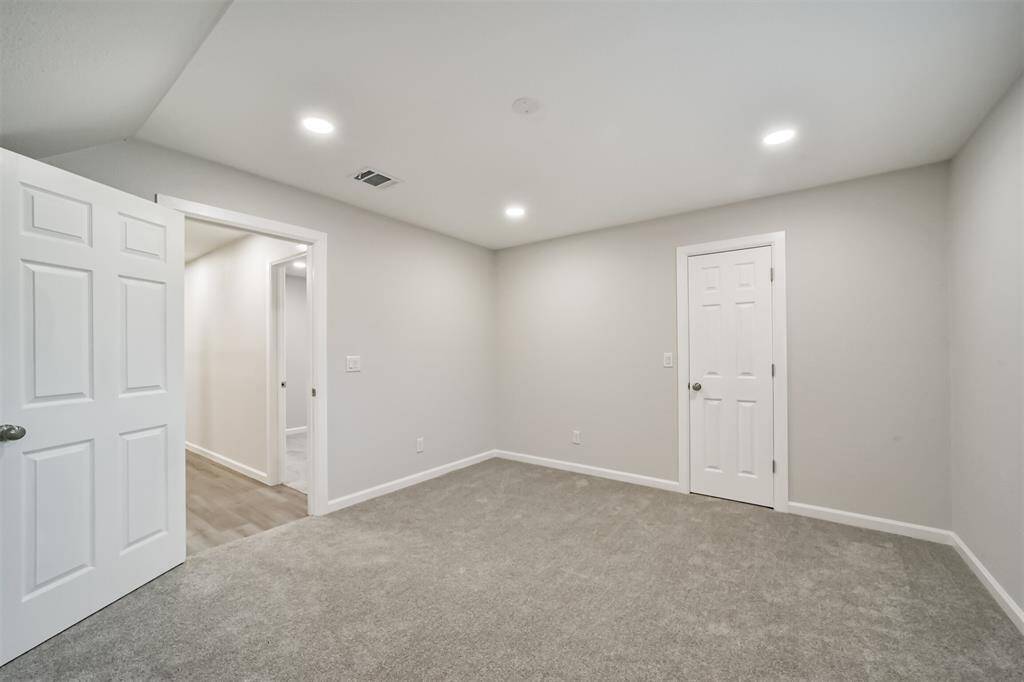 Bedroom with walk-in closet