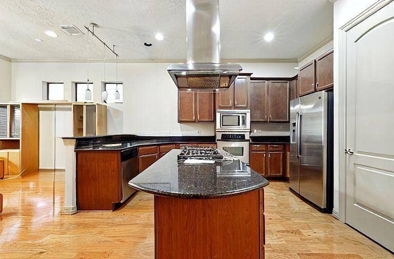 Kitchen offers a seamless flow into the living room for easy entertainment