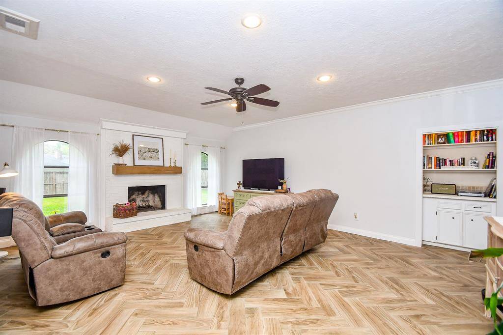 Huge Family room with recently installed wood-like tile flooring!