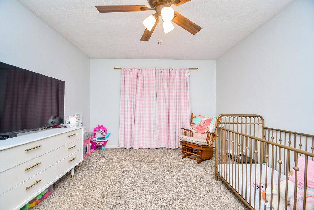 Bedroom 3 is large and has a ceiling fan!